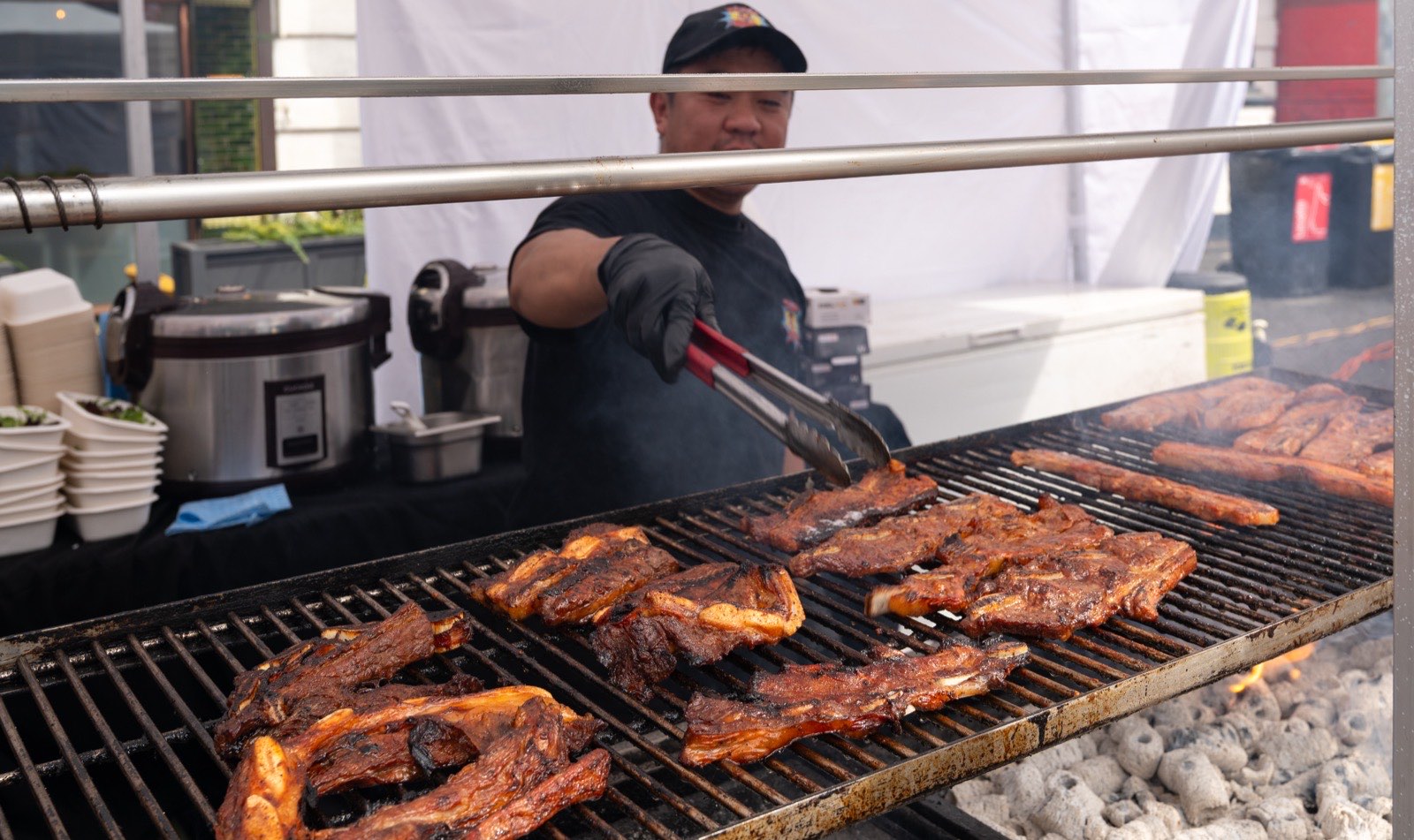 Crowds and traders grilling street food at the Glenferrie Festival