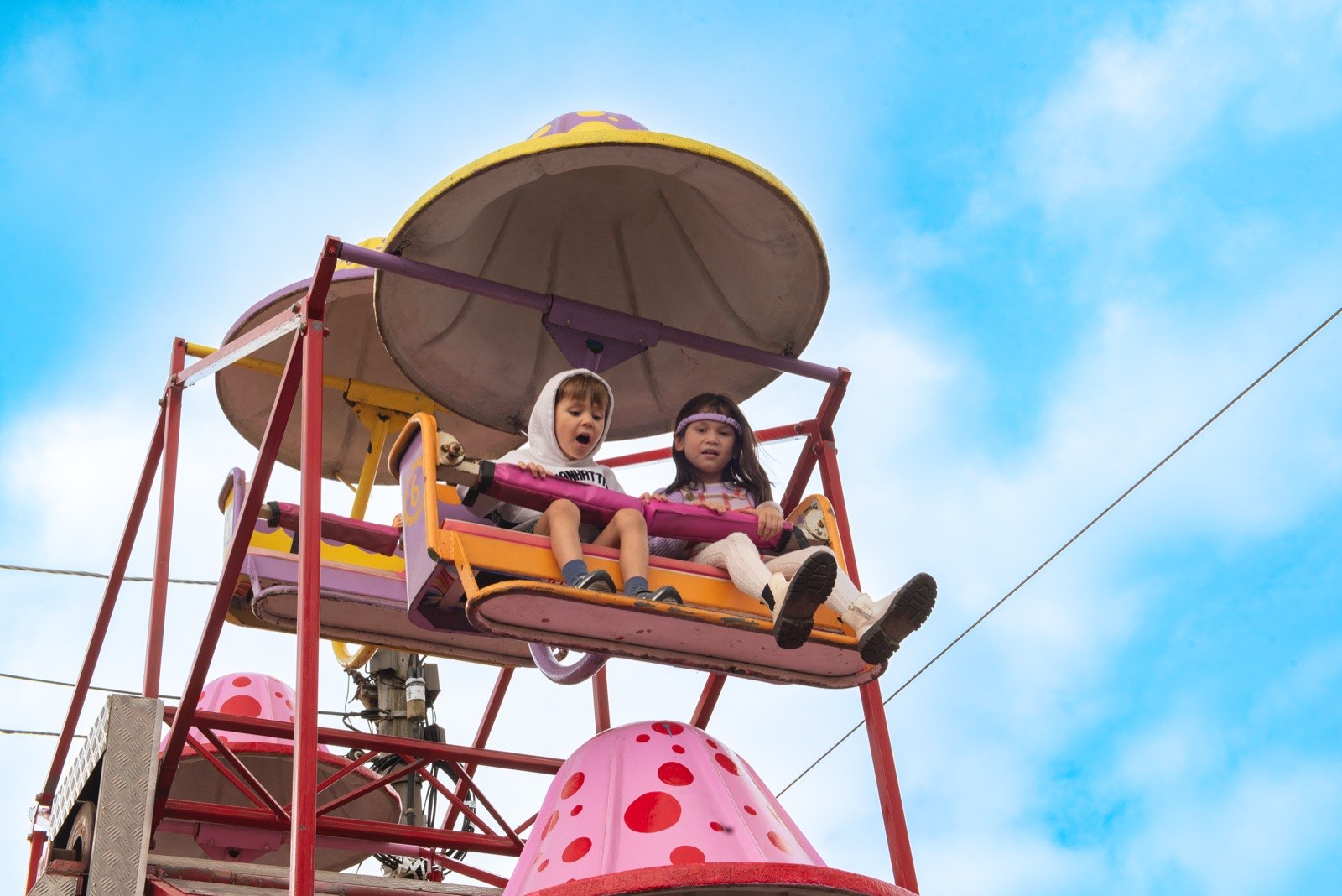 Children enjoying a carnival ride