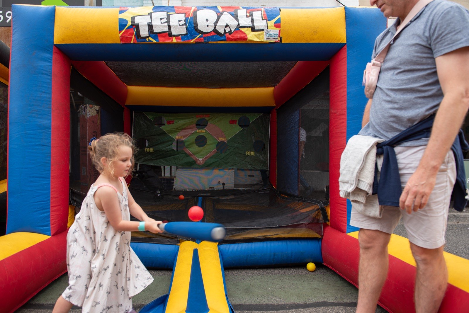Kids bouncing in an inflatable castle at the festival