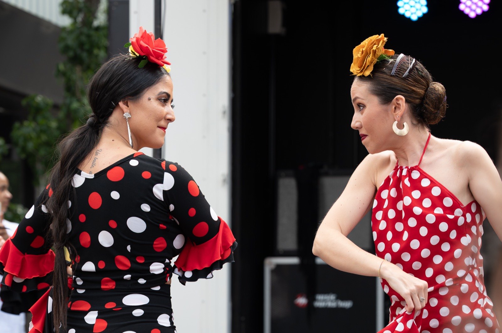 Flamenco dancers in red performing at the festival